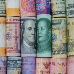 US dollar and China Yuan banknote  with multi countries banknotes. Its is symbol for tariff trade war crisis or unfair business of 2 biggest economic countries in the world.